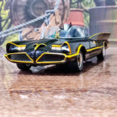 Model of the Batmobile on a wet road with blurred background