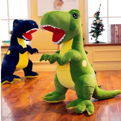 Two dinosaur plush toys on a wooden floor with a Christmas tree in the background.