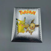 Pokémon card with Pikachu and another character on a reflective surface