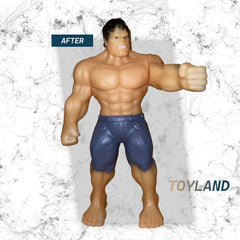 Muscular action figure with blue shorts on a textured white background, branded 'Toyland'.