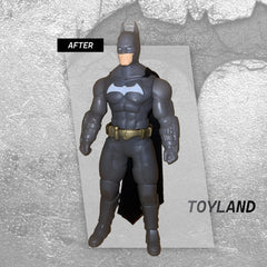 Batman action figure on a gray background with 'Toyland' branding.