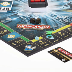 Monopoly game board with dice and cards on a white background