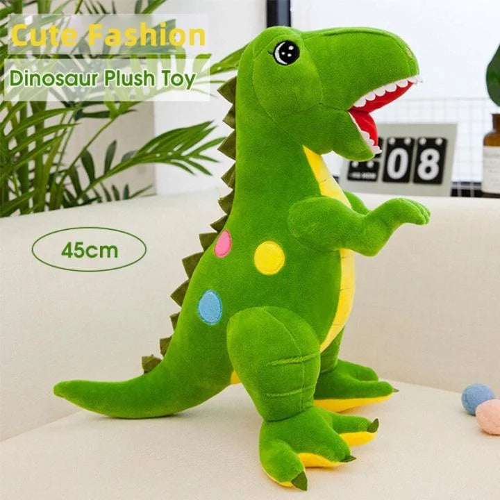 Green dinosaur plush toy on a white surface with text indicating size and description.