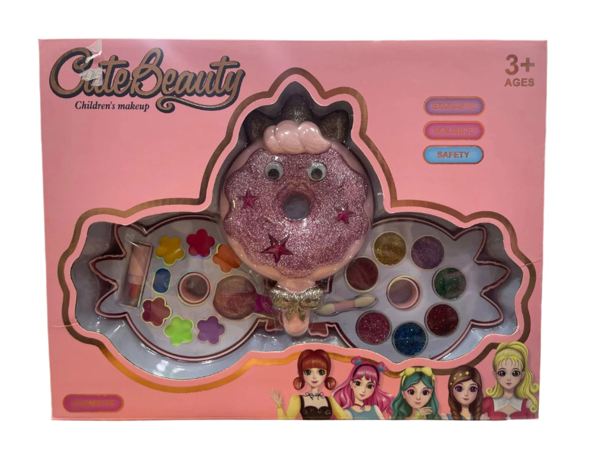 Cute Beauty children's makeup set packaging with toy face and color palette on pink background