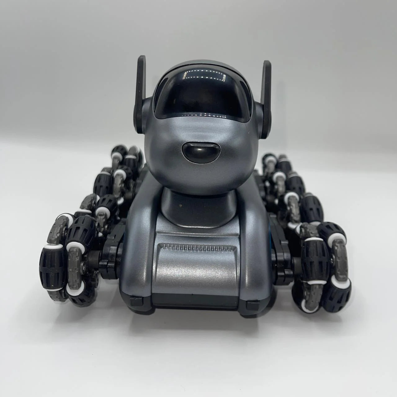 Silver robot with multiple legs on a white background