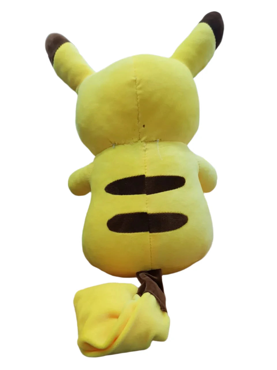 Plush toy resembling a yellow creature with brown accents on a white background
