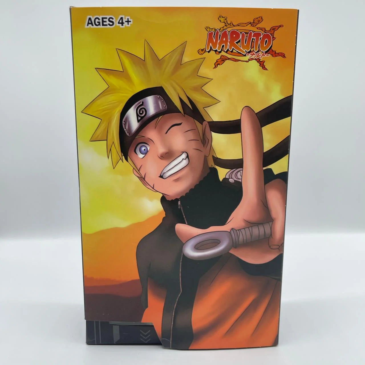 Naruto figurine packaging with character design on a white background